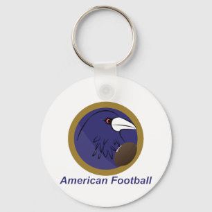 Raven with american football ball keychain