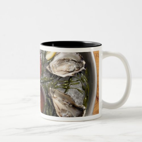 Raw oysters arranged Two_Tone coffee mug