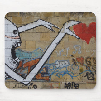 Reaching for a heart mouse pad