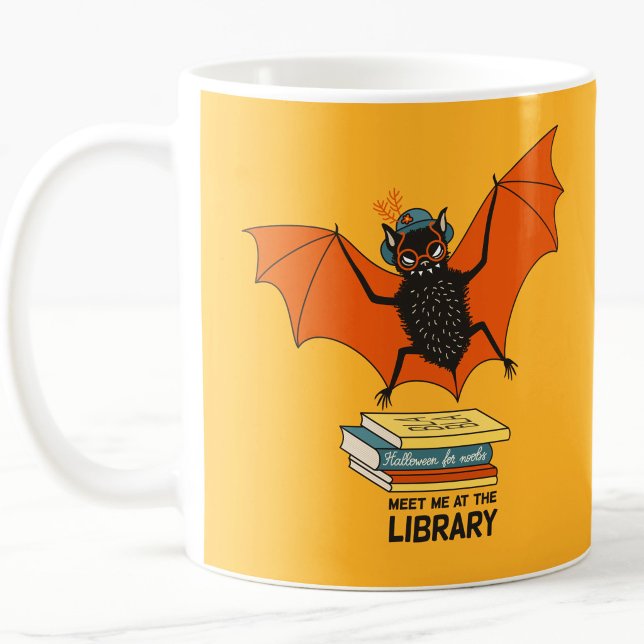 Reading Bat | Whimsical Librarian with Books Coffee Mug (librarian yellow orange ceramic mug with a cute cartoon bat with eyeglasses flying over books)