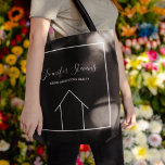 Real Estate Company Custom Modern Realtor Black Tote Bag<br><div class="desc">This modern realtor tote bag is the perfect way to market to clients. Fill your new customer home buying information into this chic, custom tote and customize with your name and real estate company. These minimalist black bags feature a simple white line drawing of a house. Advertise your realty on...</div>