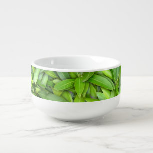 Realistic green leaves soup mug