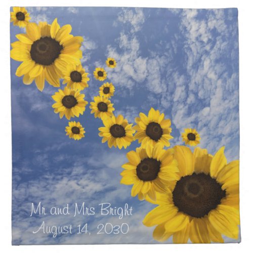 Realistic sunflowers blowing across blue sky cloth napkin