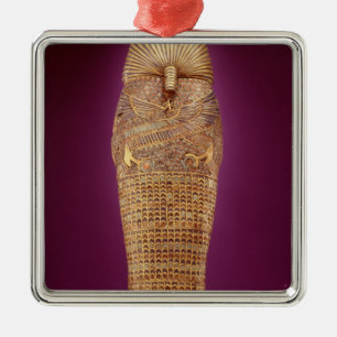 Rear view of one of the canopic coffins metal ornament