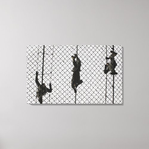 recruits completing an obstacle canvas print