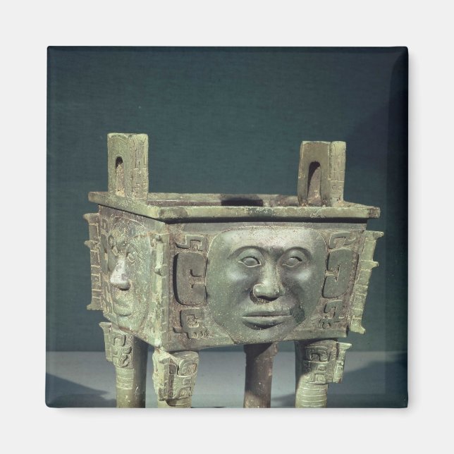 Rectangular 'ting' vessel with human faces magnet (Front)