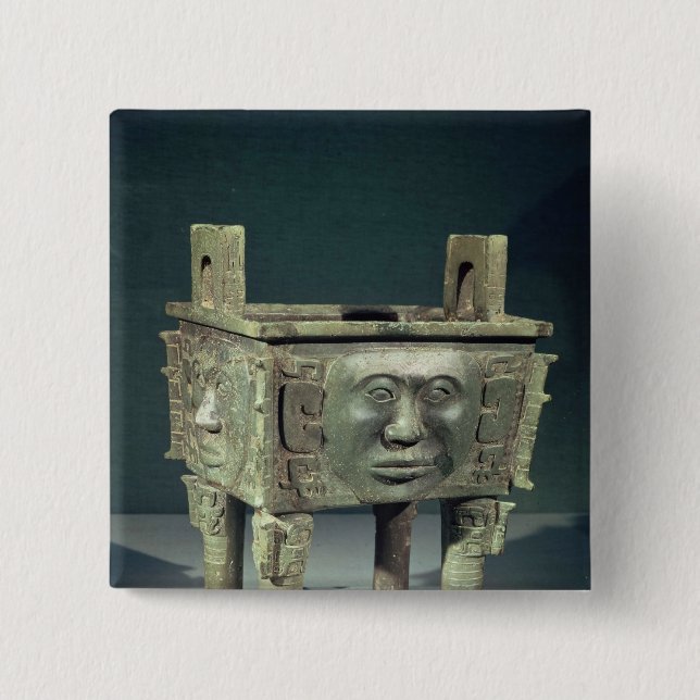 Rectangular 'ting' vessel with human faces pinback button (Front)