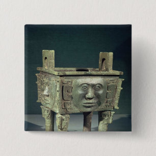 Rectangular 'ting' vessel with human faces pinback button