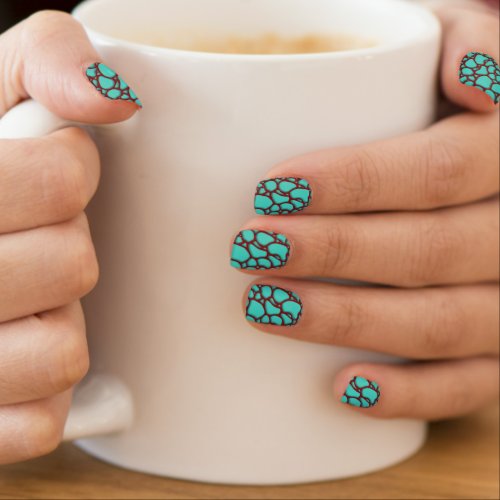 Red abstract design on a turquoise background minx nail art