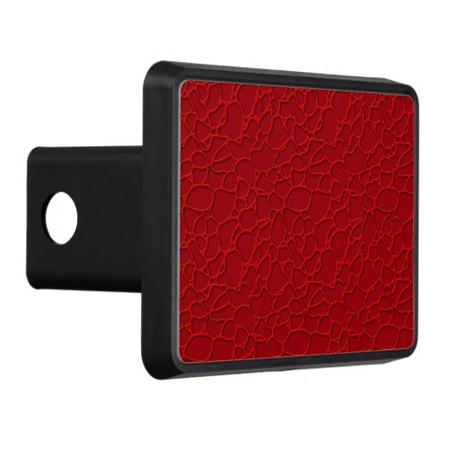 Red abstract design on burgundy background hitch cover