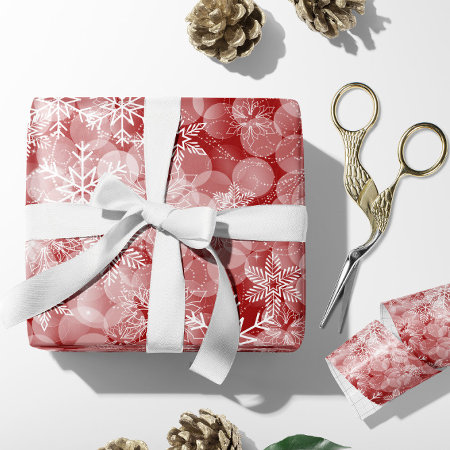 Red Abstract Pattern With White Snowflakes Wrapping Paper