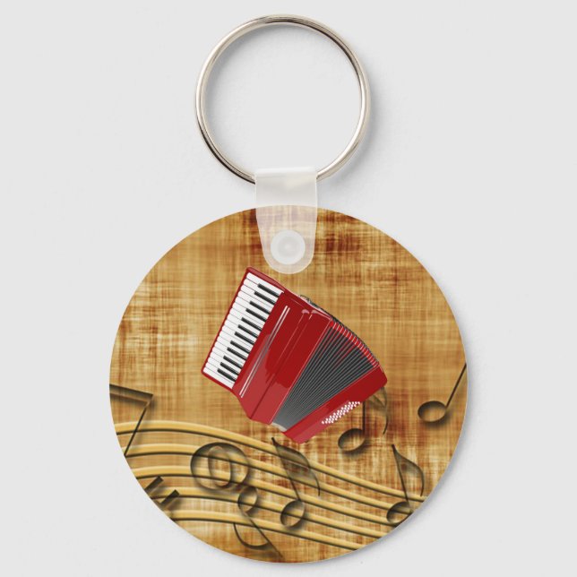 Red accordion, black notes, gold background keychain (Front)