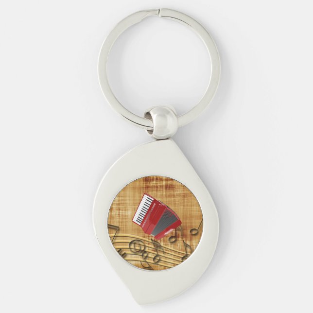 Red accordion, black notes, gold background keychain (Front)