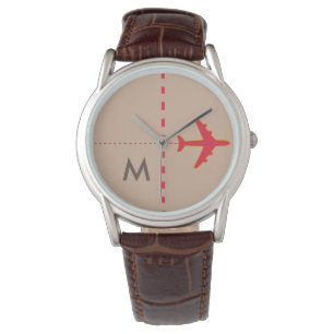 red aeroplane with initial watch