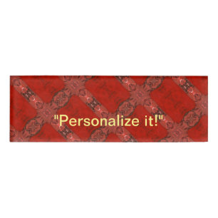 Red and black abstract design tiled and mirrored name tag