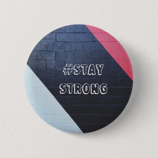 red and black abstract geometric / stay strong pinback button
