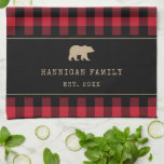Red and Black Buffalo Plaid Custom Family Name  Kitchen Towel<br><div class="desc">Wrap your kitchen in woodland charm with this cozy buffalo plaid tea towel, featuring a bold red and black check pattern and a rustic bear silhouette. The design showcases a typewriter-style text, adding a nostalgic touch that feels right at home in any country kitchen or family cabin. Personalize with your...</div>