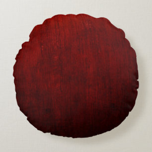 Red and black floral textile round pillow