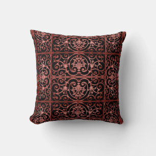 Red and black scrollwork pattern throw pillow