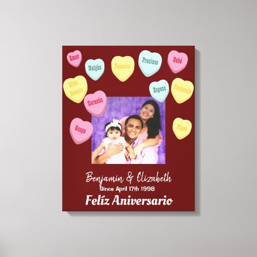 Red and candy hearts Happy anniversary Spanish  Canvas Print