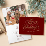Red and Gold Merry Christmas Script Photo Folded Holiday Card<br><div class="desc">This Christmas photo folded card features elegant and romantic swirly calligraphy lettering with a winter holly berry bouquet and a photo inside. For more advanced customization of this design,  please click the BLUE DESIGN TOOL BUTTON above!</div>