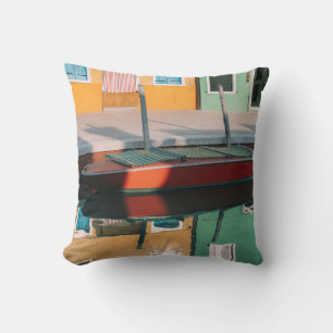 RED AND GREEN BOAT DOCKING ON DOCK THROW PILLOW