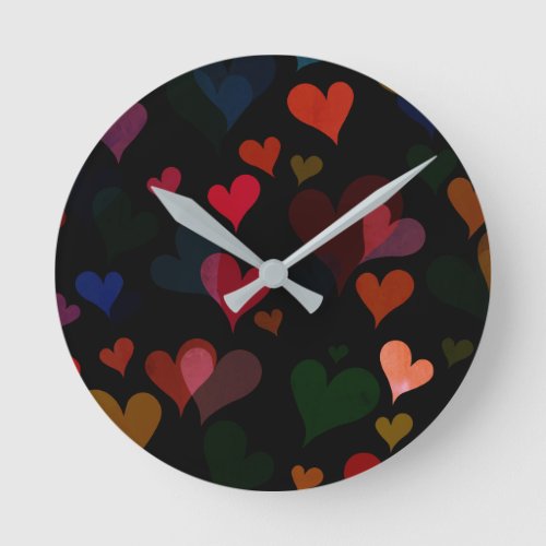 Red and green delicates hearts black background round clock