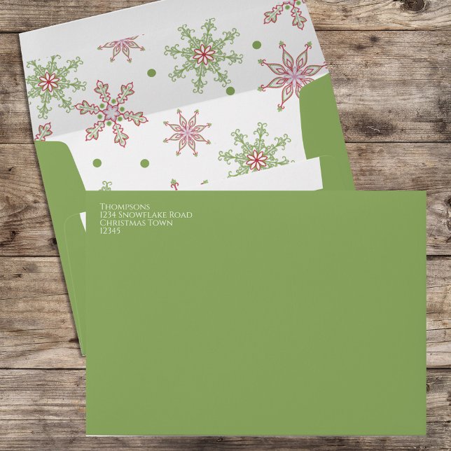 Red and Green Snowflake Christmas Return Address Envelope (Red and green snowflake pattern envelope with return address on the front.)