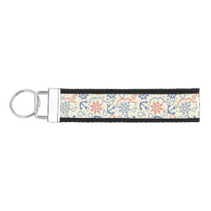 Red and navy background with anchor wrist keychain