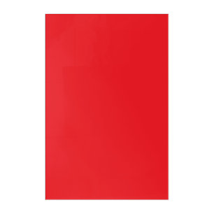 Red and orange crayons lying side by side on a whi acrylic print