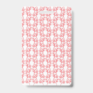 Red and pink wrapping paper featuring a repeating badge