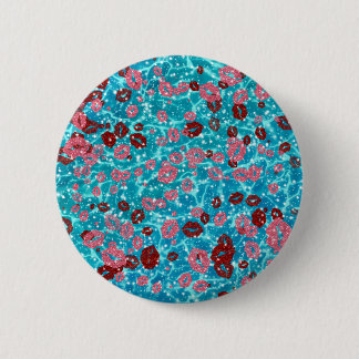 Red and rose kisses in the blue ocean button