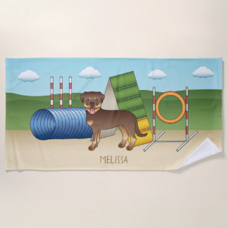 Red And Tan Rottweiler Dog With Agility Equipment Beach Towel