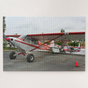 Red and white aircraft, Lake Hood, Alaska Jigsaw Puzzle