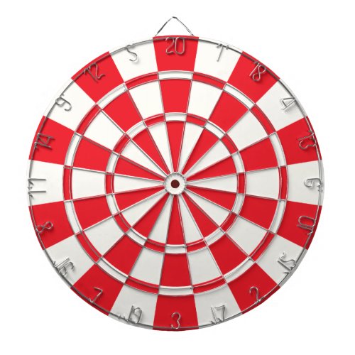 Red And White Dartboard With Darts