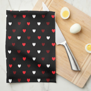 Red and white hearts on black kitchen towel