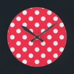 Red and White Polka Dots Round Clock<br><div class="desc">This graphic features a pattern of red and white polka dots. White dots are featured against a red background.</div>