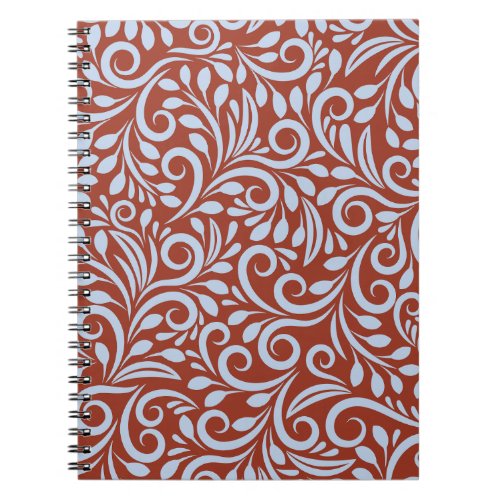 Red and white swirl pattern notebook