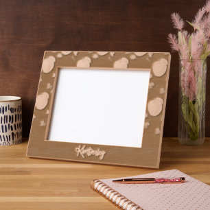 Red apples and leaves on black engraved frames