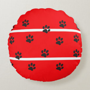 Red background black cat paws round pillow