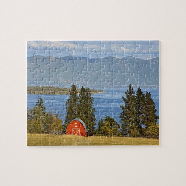 Red barn sits along scenic Flathead Lake near Jigsaw Puzzle (Horizontal)
