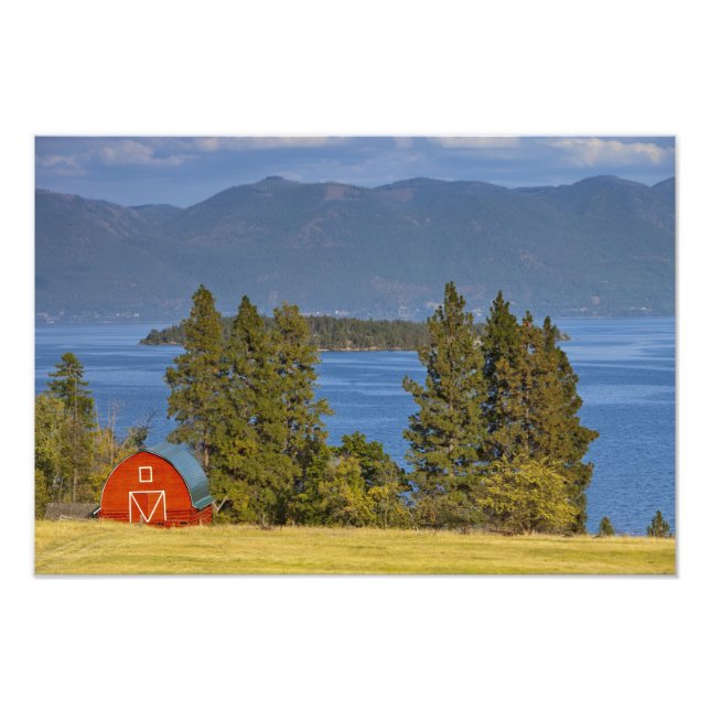 Red barn sits along scenic Flathead Lake near Photo Print (Front)