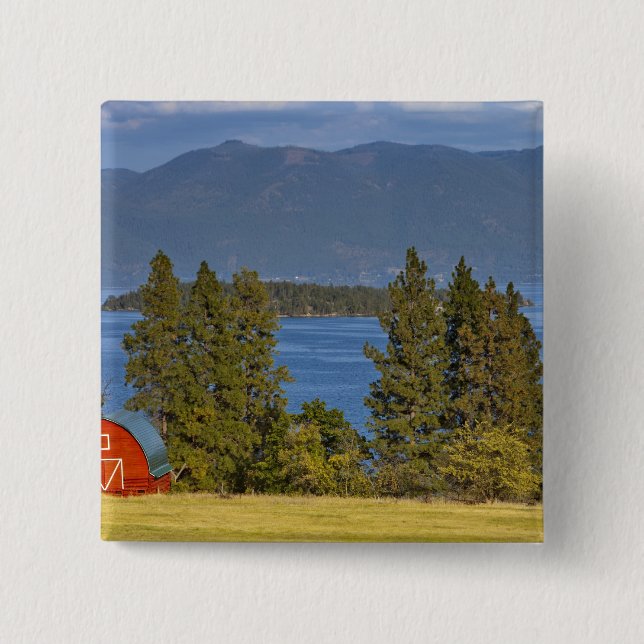 Red barn sits along scenic Flathead Lake near Pinback Button (Front)