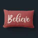 Red Believe Script Christmas pillow<br><div class="desc">Believe Handwriting | Holiday Throw Pillow in red and creme. Modern farmhouse typography design by Blackberry Boulevard "Believe" written in a creme colored script font on a solid red color background. Coordinates with the coastal Christmas collection. Other colors available in store. Perfect accent pillow for your holiday home decor.</div>