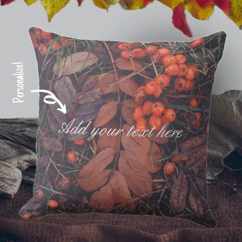 Red berries and brown autumn leaves throw pillow