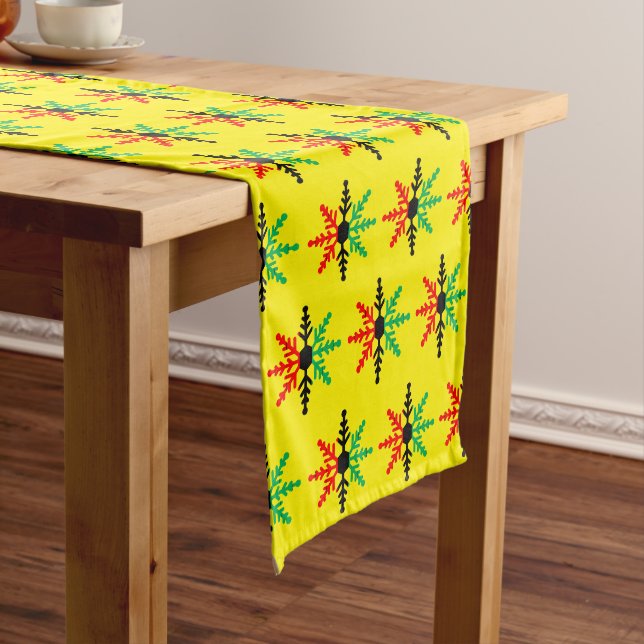 Red Black Green Yellow Snowflakes Kwanzaa Long Table Runner (In Situ)