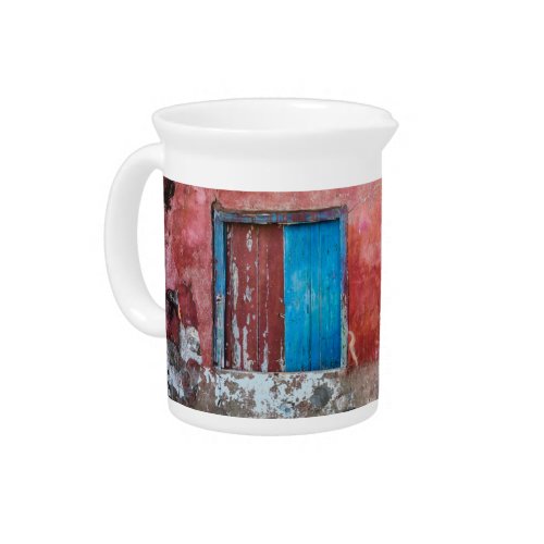 Red blue and grey wall door and window beverage pitcher