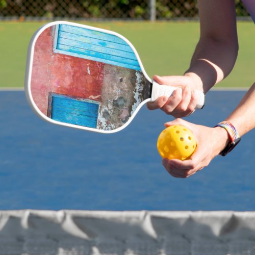 Red blue and grey wall door and window pickleball paddle