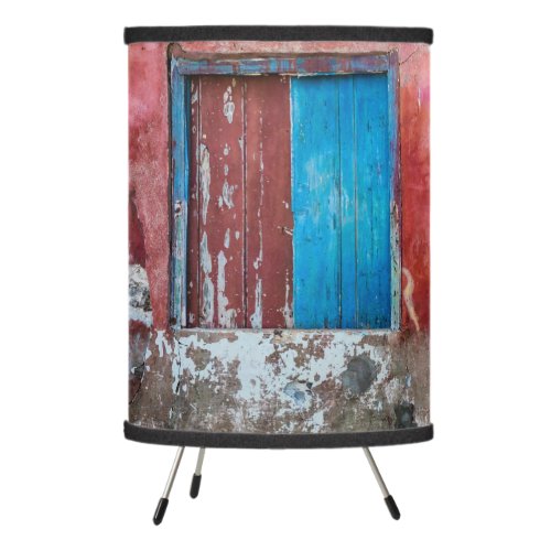 Red blue and grey wall door and window tripod lamp