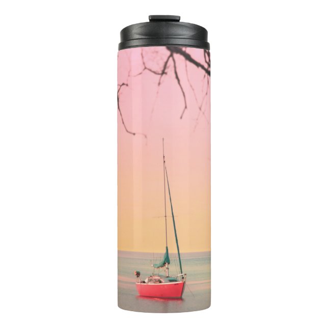 RED BOAT ON BEACH DURING SUNSET THERMAL TUMBLER (Front)